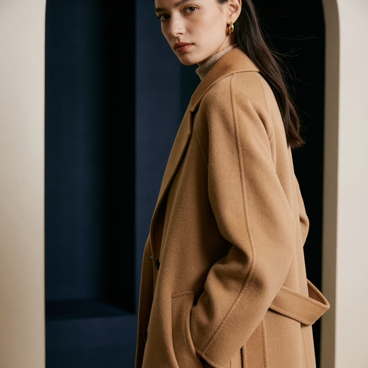 A Ribquinn camel cashmere coat styled with quiet, modern elegance